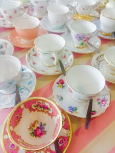 An image of teacups, to invite you to get a brew